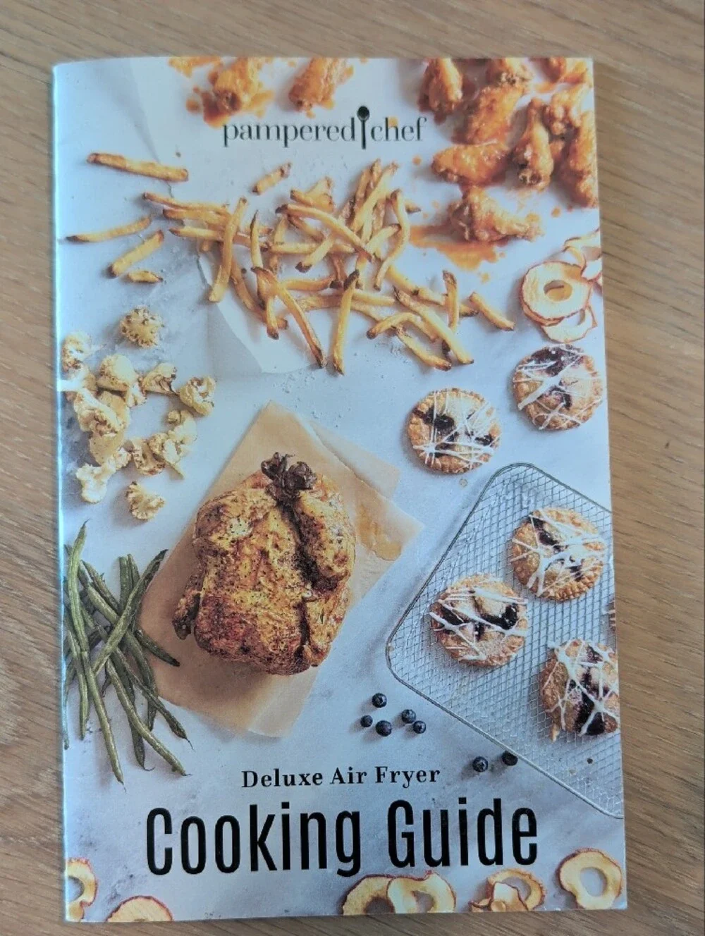 7 Pampered Chef Recipe Booklets.